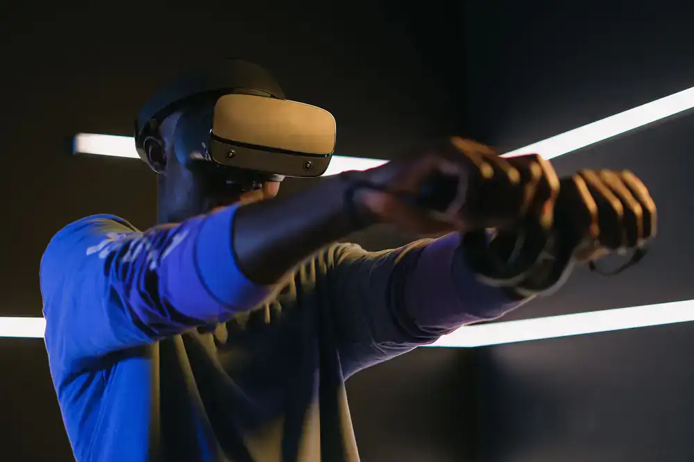 Player getting ready in neon-lit VR studio